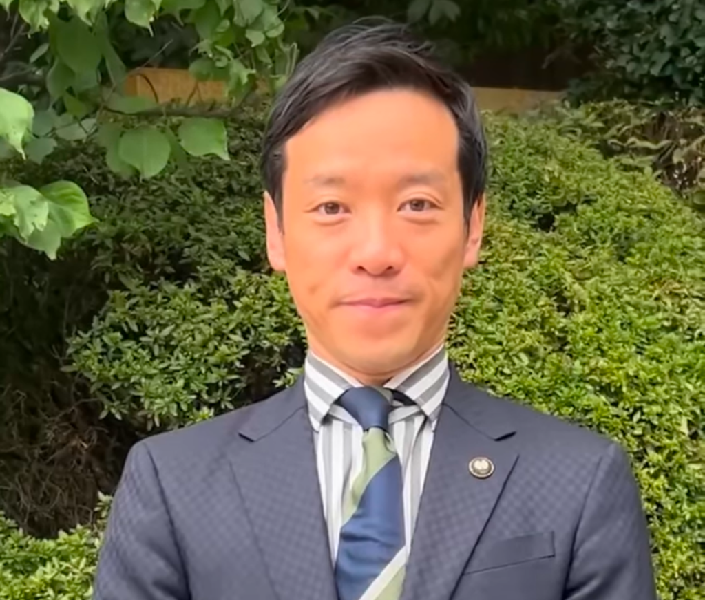 南出賢一の経歴