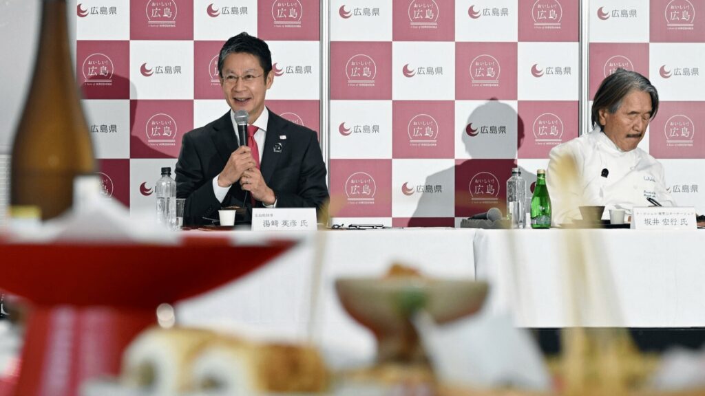 湯崎英彦の経歴